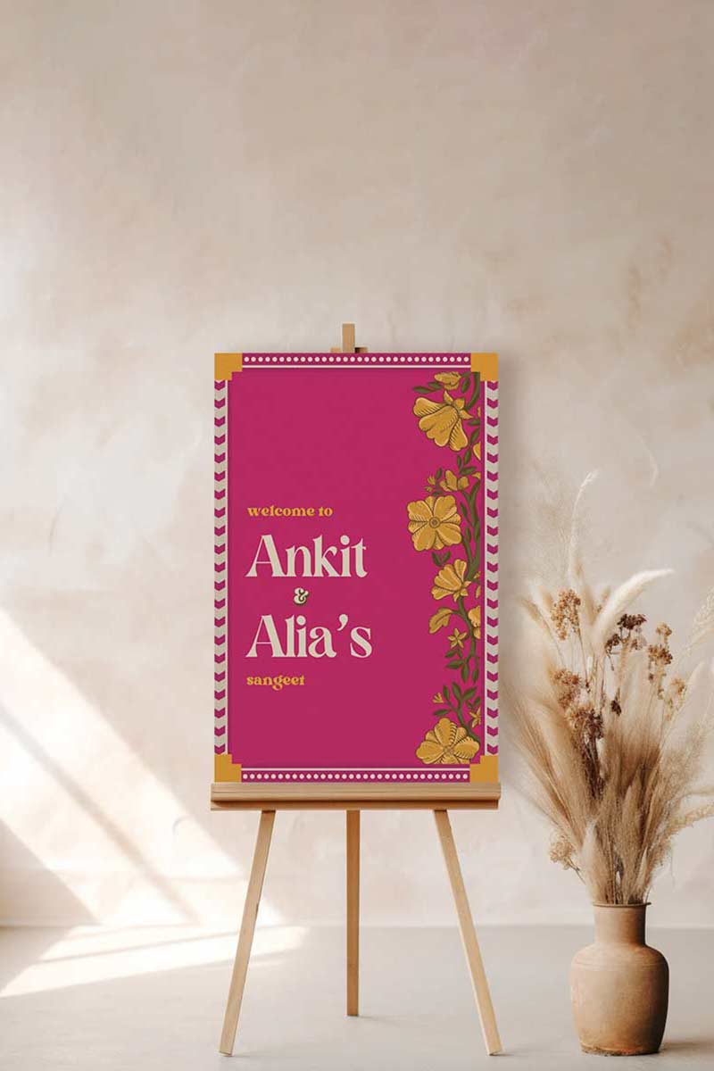 Retro Wedding Welcome Sign with florals in the shades of hot pink, yellow, and beige. Indian Wedding Events like jago, sangeet, mehndi, haldi, chunni & maiyan. Personalize and customize in Canva. Print at any local printer around the World.
