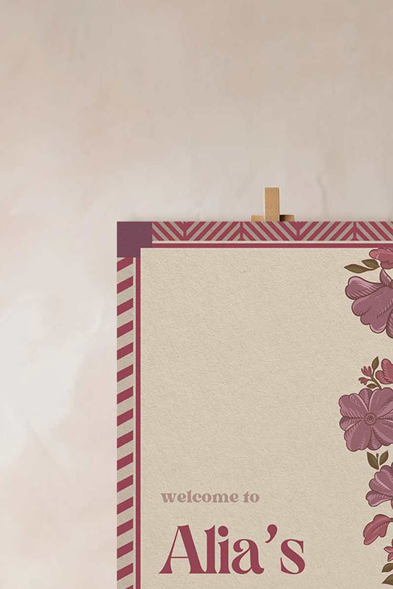 Retro Wedding Welcome Sign with florals in the shades of wine purple, pink, & beige. Indian Wedding Events like jago, sangeet, mehndi, haldi, chunni & maiyan. Personalize and customize in Canva. Print at any local printer around the World.