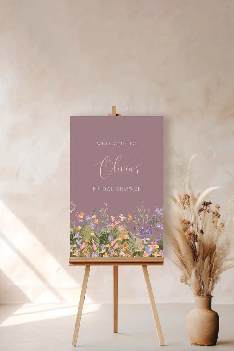 Wedding Welcome Sign with soft florals in the shades of pink, purple, blush & mauve. Dior Florals. Wedding Events like engagement, bridal shower baby shower, & wedding. Personalize and customize in Canva. Print at any local printer around the World.