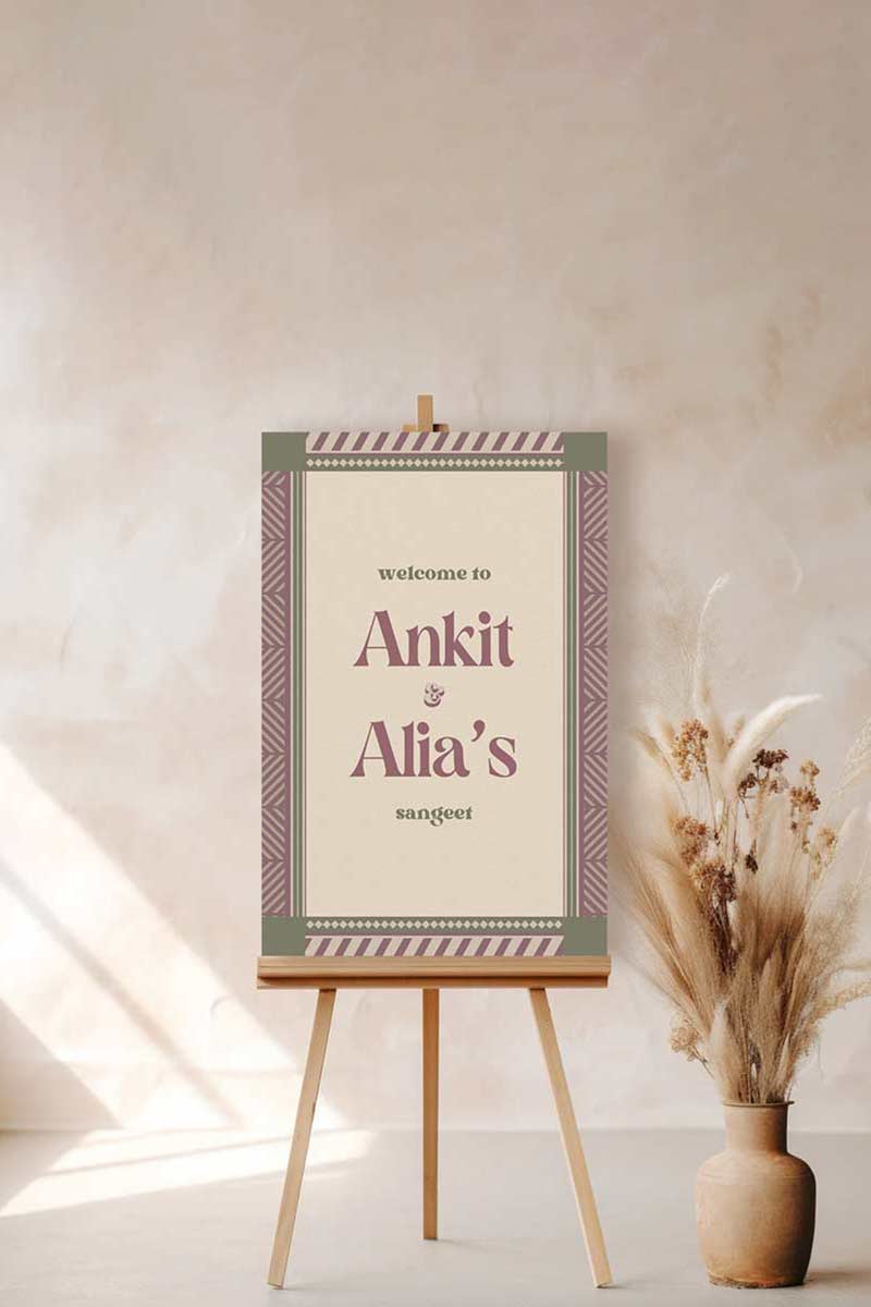 Retro Jaipur block print Welcome Sign with florals in the shades of purple, green, and beige. Chevron bordered design. Tribal prints. Indian Wedding Events like jago, sangeet, mehndi, haldi, chunni & maiyan. Personalize and customize in Canva. Print at any local printer around the World.