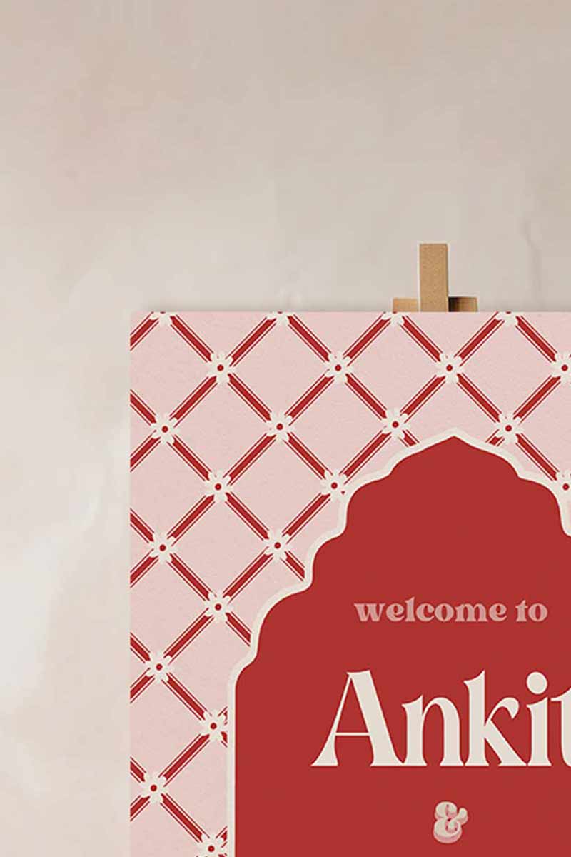 Jaipur floral block print Welcome Sign with arched stripes and chevron pattern in the shades of red, pink, and beige. Indian Wedding Events like jago, sangeet, mehndi, haldi, chunni & maiyan. Inspired by Villa Palladio Jaipur. Palace Arches. Traditional and modern indian design. Personalize and customize in Canva. Print at any local printer around the World.