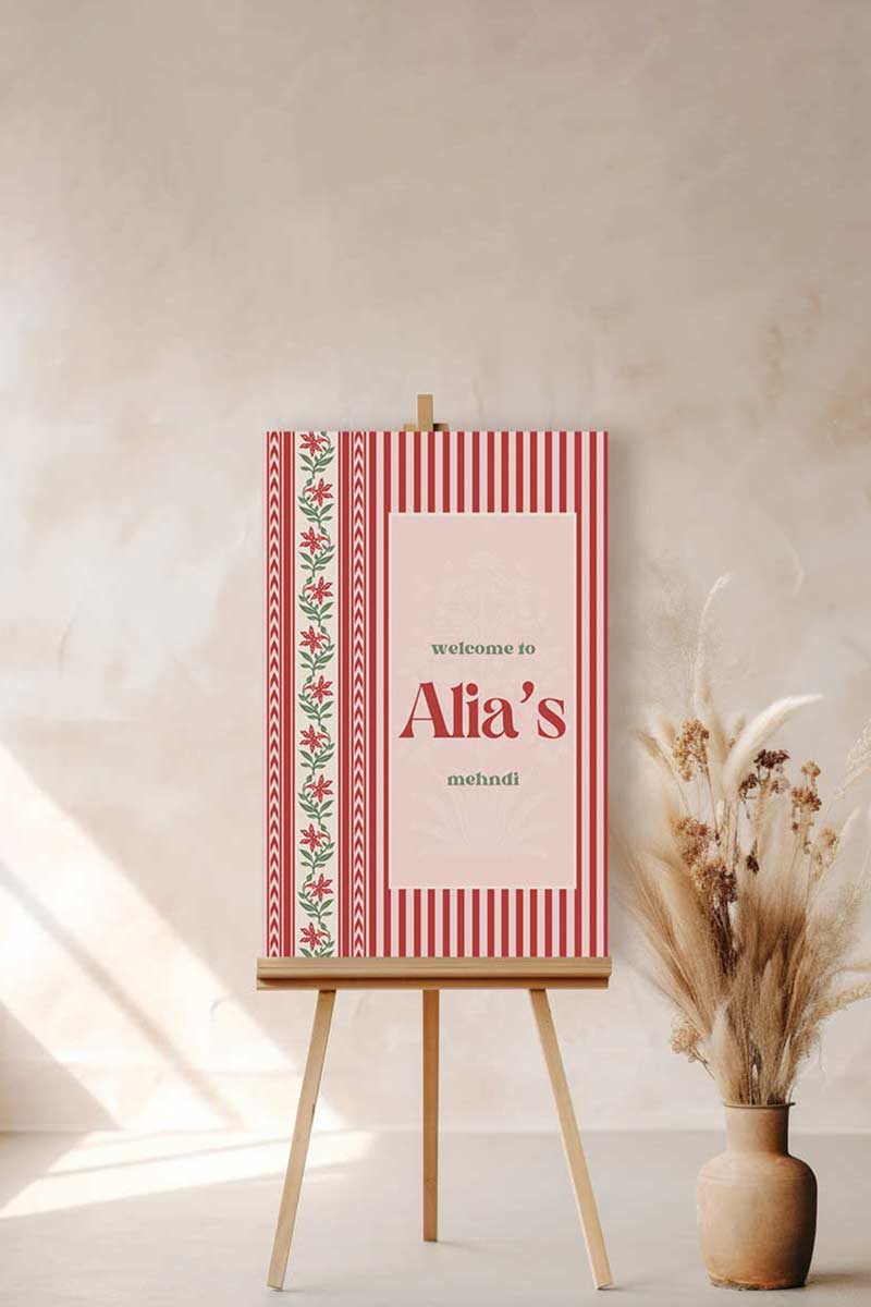 Jaipur block print Welcome Sign with florals stripes and chevron pattern in the shades of red, pink, and beige. Indian Wedding Events like jago, sangeet, mehndi, haldi, chunni & maiyan. Inspired by Villa Palladio Jaipur. Palace Arches. Traditional and modern indian design. Personalize and customize in Canva. Print at any local printer around the World.
