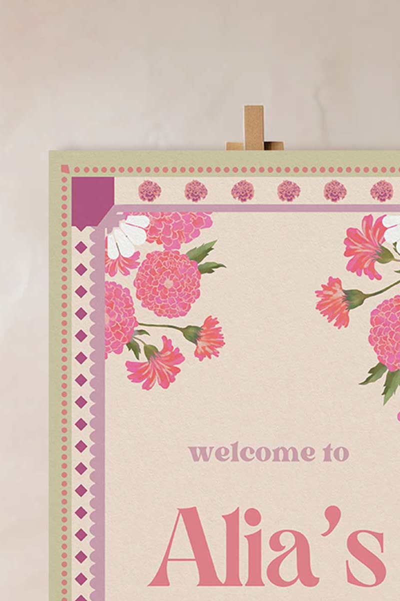 Pink & Purple Retro Wedding Welcome Sign with pink marigold florals. Pastel colours. Indian Wedding events for Sangeet, Haldi, Maiyan or Jago. Wedding Signage. Personalize and customize in Canva. Digital Download.  Print around the world at a local print shop.