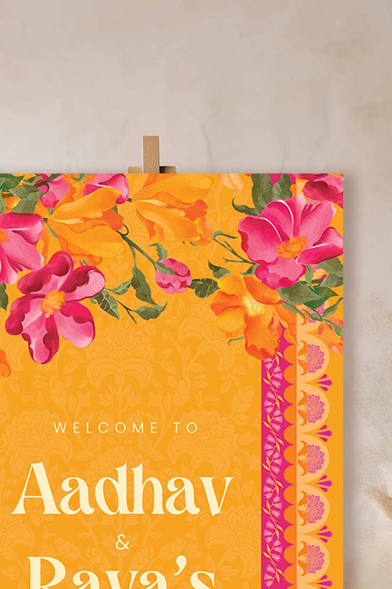 Orange, yellow & pink retro Wedding Welcome Sign with orange marigold florals. Pink roses. Tradiitonal Indian wedding sign. Indian Wedding events for Sangeet, Haldi, Maiyan or Jago. Wedding Signage. Personalize and customize in Canva. Digital Download.  Print around the world at a local print shop.