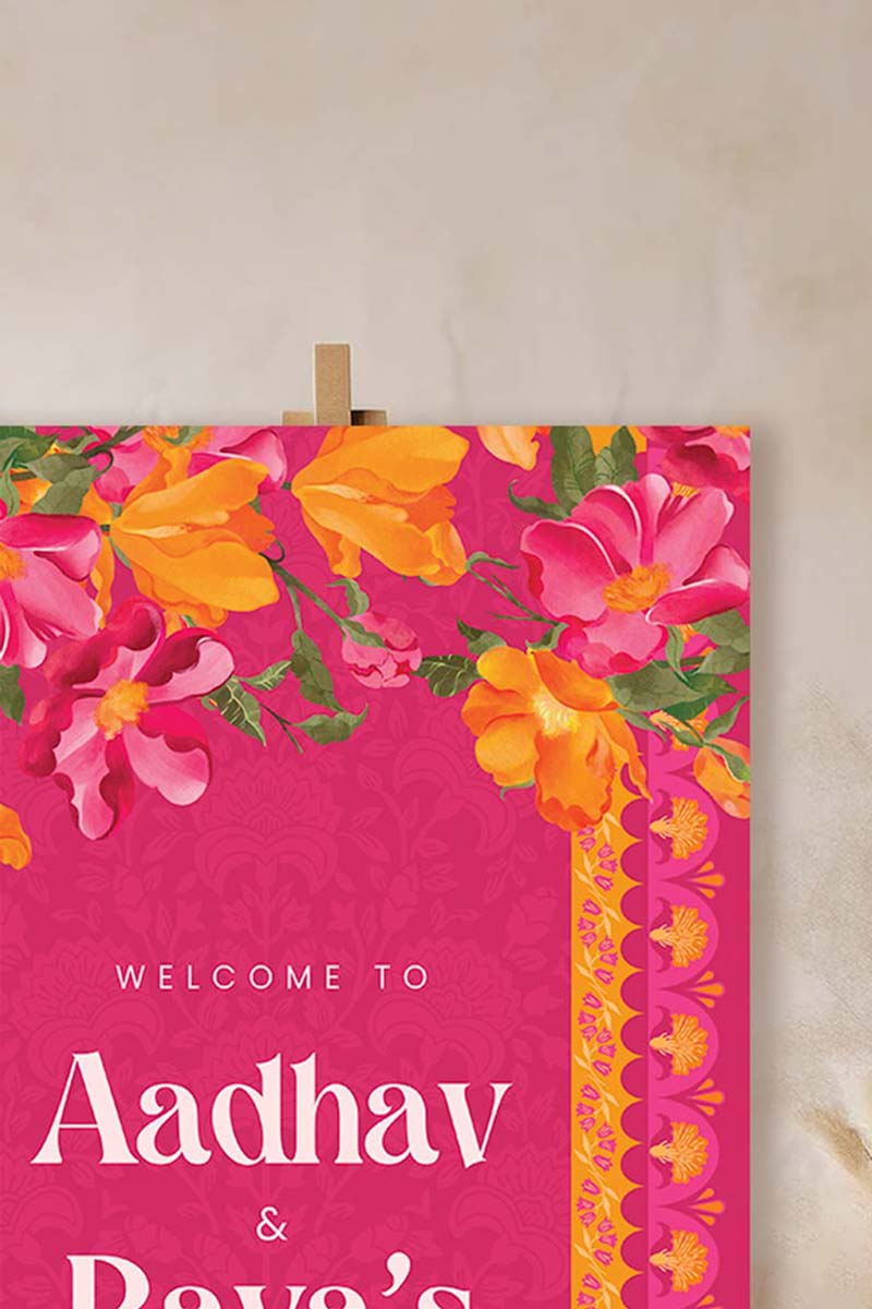 Orange, yellow & pink retro Wedding Welcome Sign with orange marigold florals. Pink roses. Tradiitonal Indian wedding sign. Indian Wedding events for Sangeet, Haldi, Maiyan or Jago. Wedding Signage. Personalize and customize in Canva. Digital Download.  Print around the world at a local print shop.
