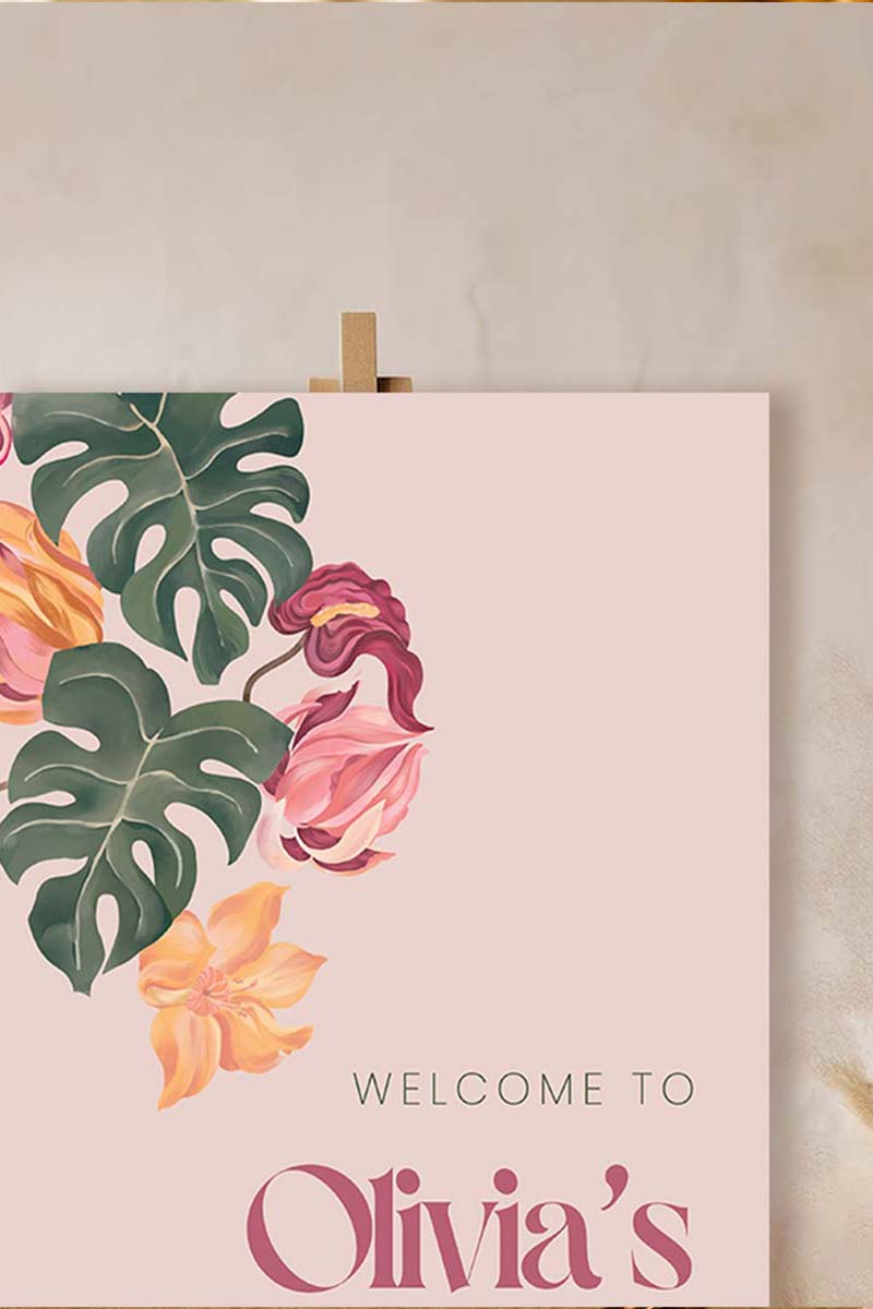 Tropical foliage & floral Wedding Welcome Sign. In the shades of pink, hot pink, green, teal, orange, yellow, forest green & beige. Tropical Jungle theme event. Indian Wedding Events like engagement, baby shower, bridal shower, birthday, jago, sangeet, mehndi, haldi, wedding & maiyan. Personalize and customize in Canva. Print at any local printer around the World. Digital Canva Template