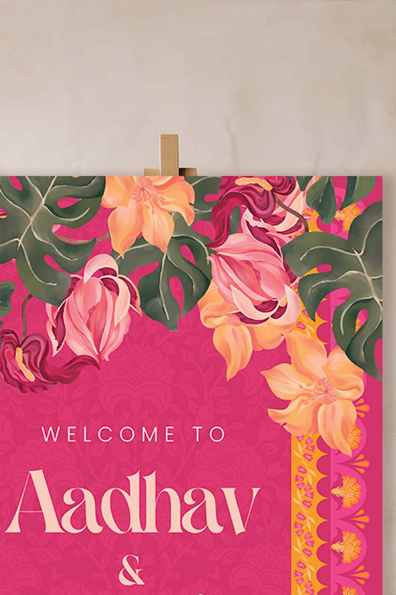 Orange, yellow & pink tropical floral Wedding Welcome Sign with orange marigold florals. Pink roses. Traditional Indian wedding sign. Indian Wedding events for Sangeet, Haldi, Maiyan or Jago. Wedding Signage. Personalize and customize in Canva. Digital Download.  Print around the world at a local print shop.