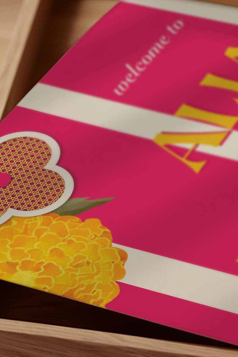 A modern wedding welcome sign featuring a bold fusion of iconic clover silhouettes and vibrant yellow marigolds. This sophisticated design blends contemporary style with traditional heritage, perfect for a Sangeet, Haldi, or reception. A high-resolution printable template with customizable text and colors by Heirloom Stationery.