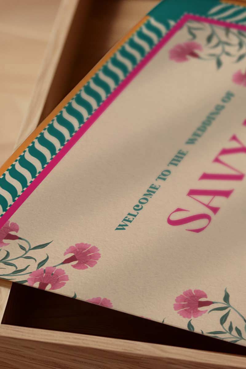 Retro Jaipur Floral Motif Wedding folded program card in the shades of hot pink, teal, yellow, green, and white. With pink florals. Jaipur block print artwork. It is inspired by the retro Indian era style design and art. Sized at 5" x 7" with front and back design options. Indian Wedding Invitation Set. Personalize and customize in Canva. Print at any local printer around the World. Florals & Birds