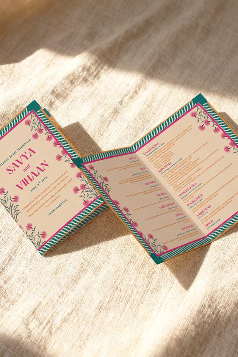 Retro Jaipur Floral Motif Wedding folded program card in the shades of hot pink, teal, yellow, green, and white. With pink florals. Jaipur block print artwork. It is inspired by the retro Indian era style design and art. Sized at 5" x 7" with front and back design options. Indian Wedding Invitation Set. Personalize and customize in Canva. Print at any local printer around the World. Florals & Birds