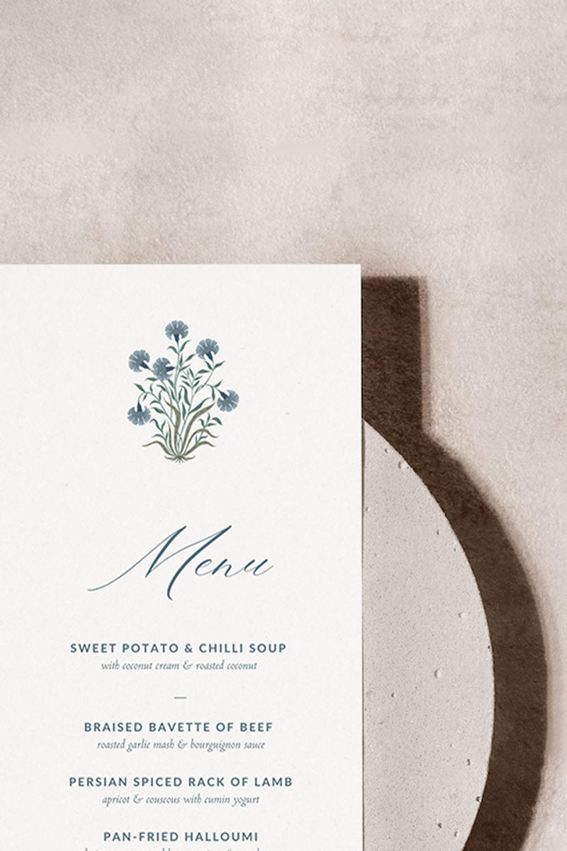 Indian blue floral motif wedding menu card. Sized to 4" x 9". Elegant design with modern typography. Plated menu card for events. Wedding ceremony, reception, sangeet, haldi, mehndi. Digital download and editable in Canva. 